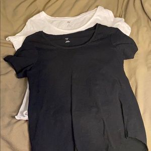 A white and a black plain tee
